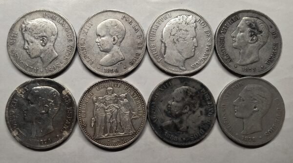 Lote de moneda 0.900 a spot -1%