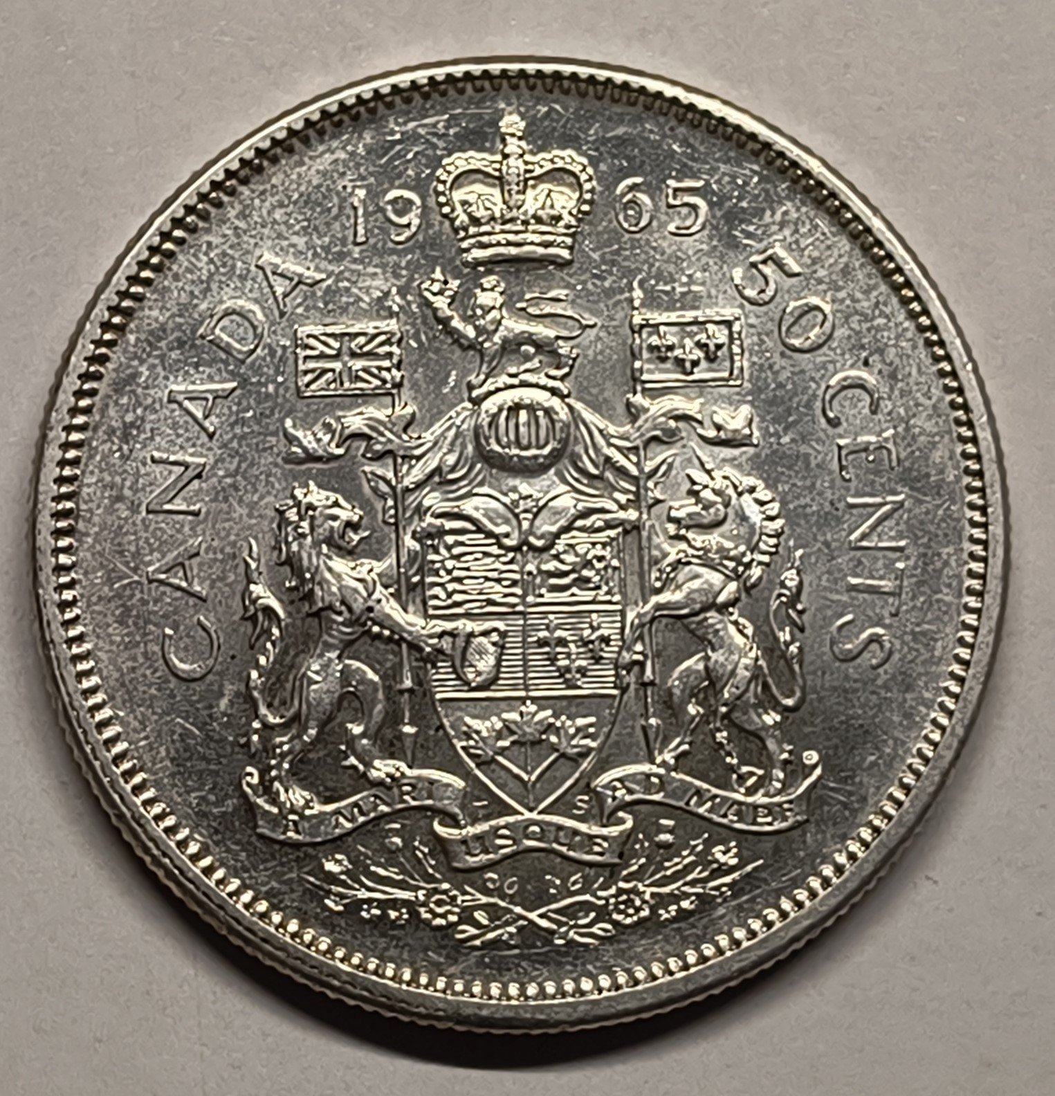50 Cents Canadá 1965 – Isabel II · Plata 0,800 · ArgentumSun — Reverso