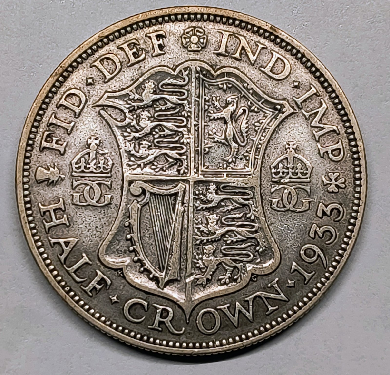 Half Crown George V 1933 Reino Unido · Plata 0,500 · ArgentumSun — Reverso